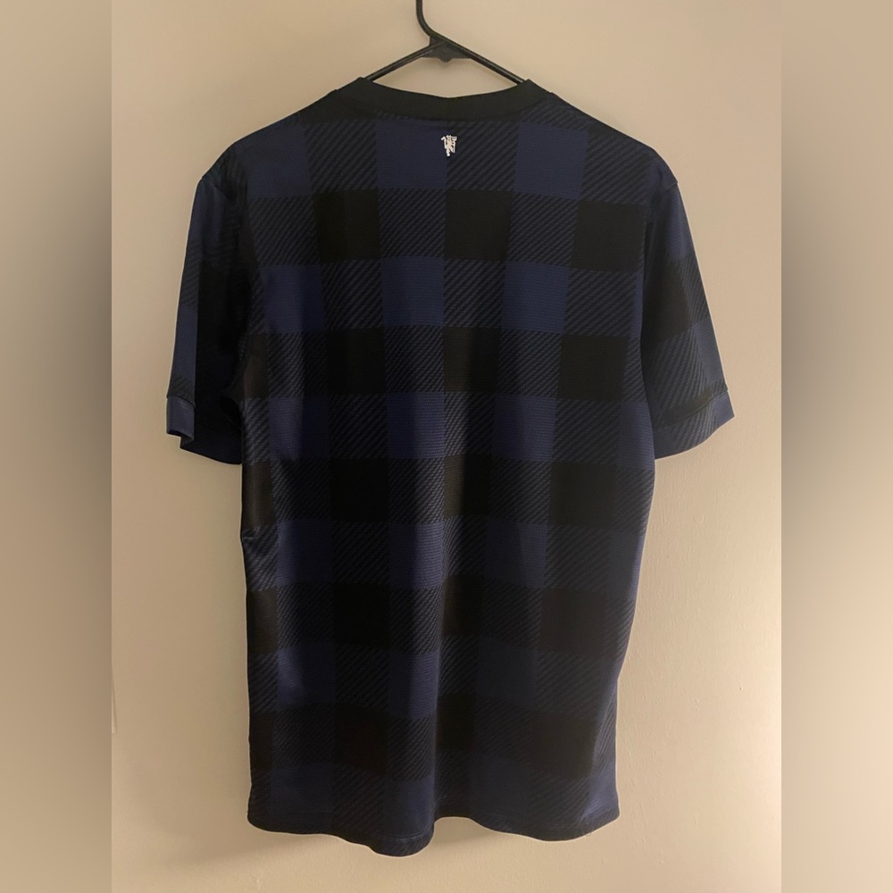 Man untied soccer jersey